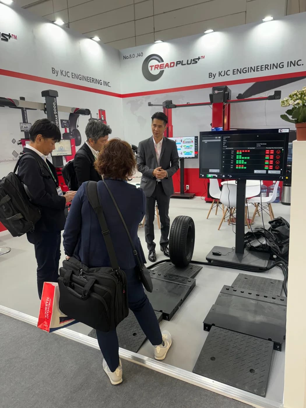 Visitors reviewing TreadPlus equipment in Frankfurt